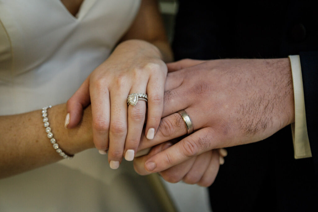Wedding rings and engagement ring detail shot at New Jersey winter wedding