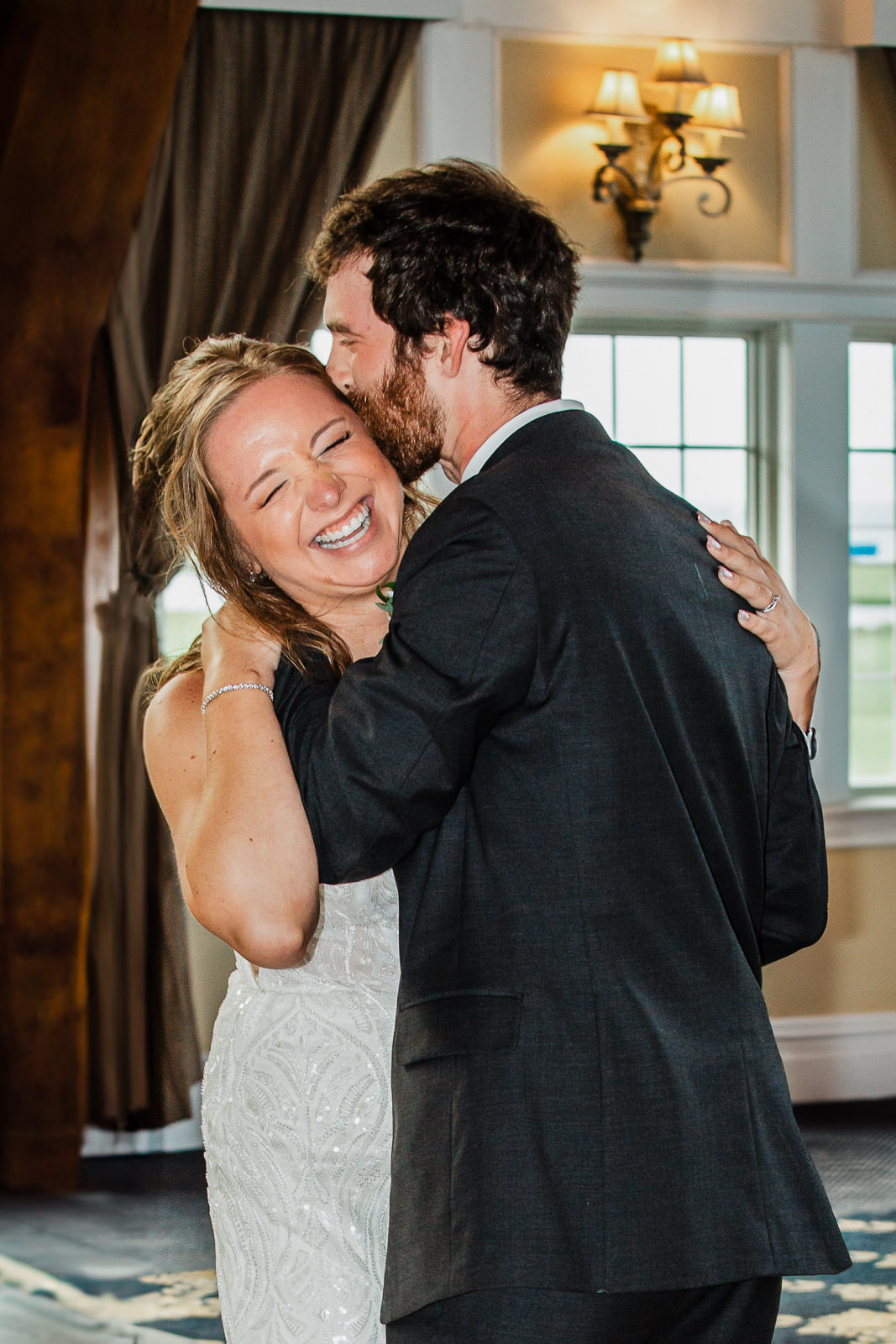 Bride laughing during a wedding first dance at Bonnet Island Estate in New Jersey