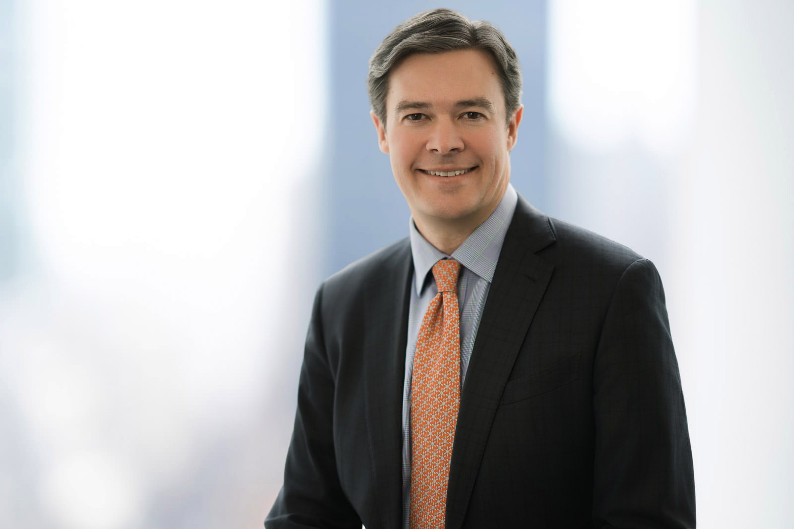 Executive headshot NJ — natural retouching that keeps skin texture and credibility intact