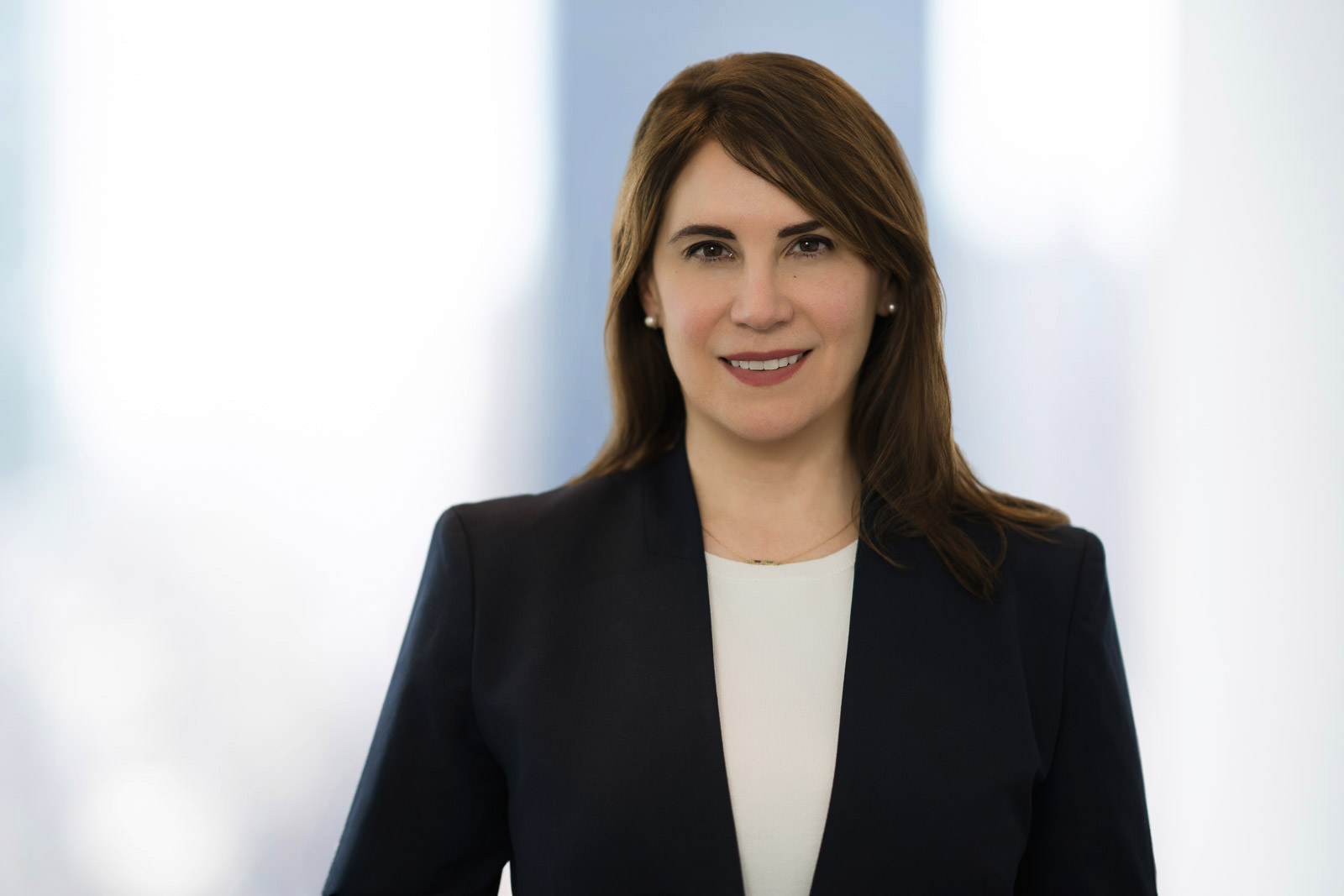 Corporate headshot NJ — natural vs retouched headshot showing authentic professional look