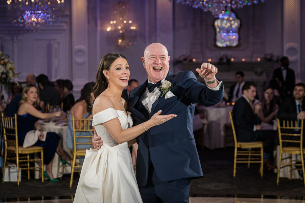 Father and daughter share a joyful unposed moment during wedding dance at The Rockleigh in Northern New Jersey