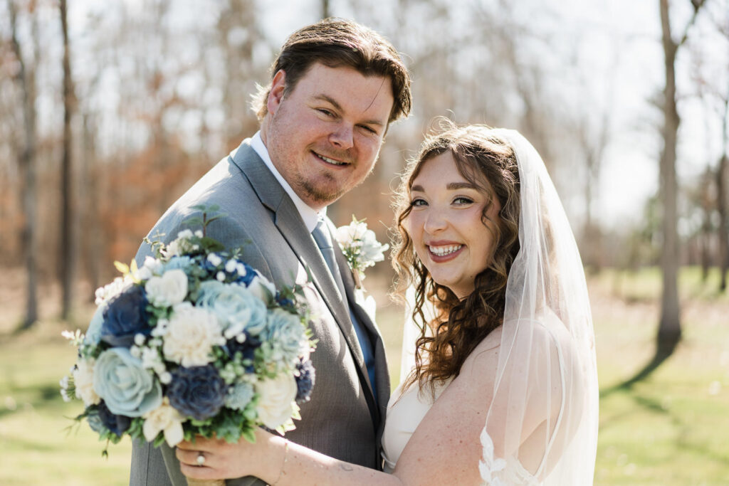 ds-golf-club-wedding-bride-groom-portrait-smiling.jpg Alt text: Close portrait of smiling bride and groom at outdoor Pinelands Golf Club wedding New Jersey