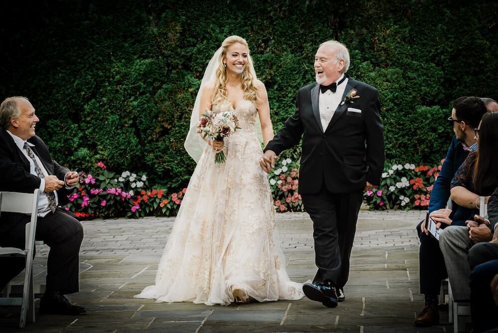 Father walking daughter down the aisle at Crystal Plaza NJ during full-day wedding coverage by Alex Kaplan