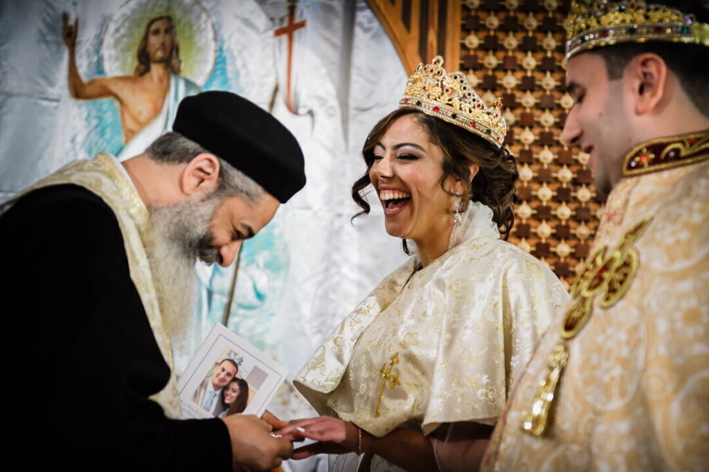 Joyful ring exchange ceremony moment captured at a New Jersey wedding by Alex Kaplan Photography