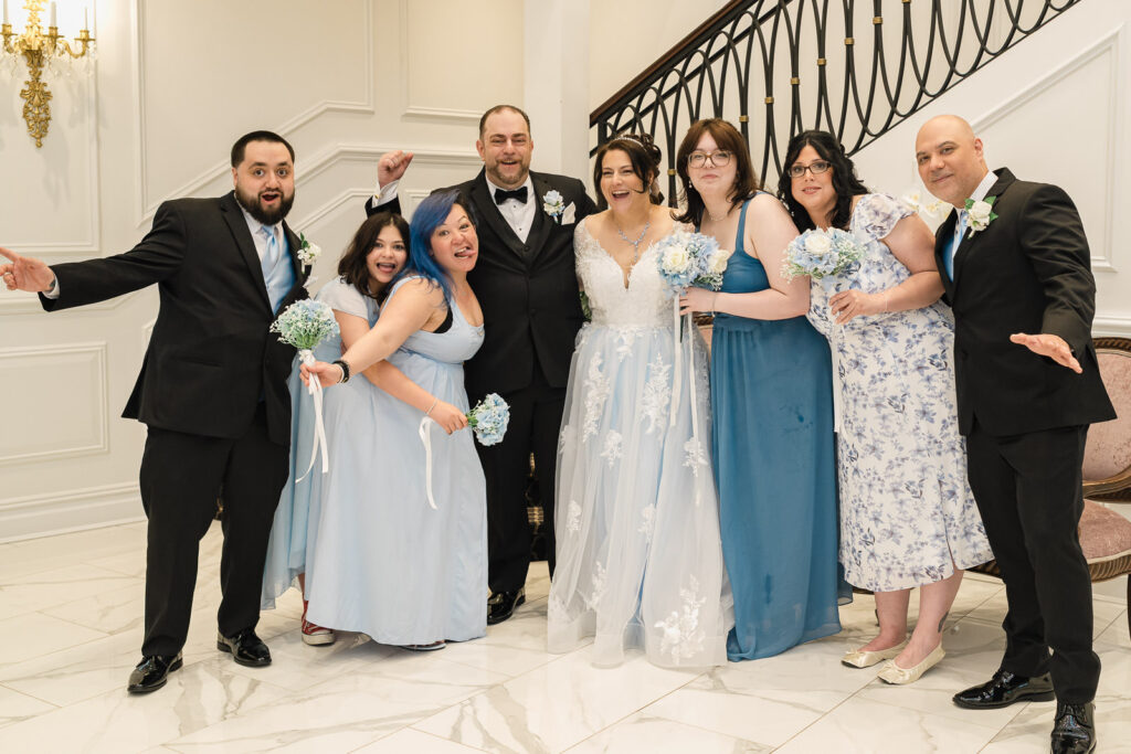 Fun bridal party photo on staircase at Macaluso's wedding Hawthorne NJ