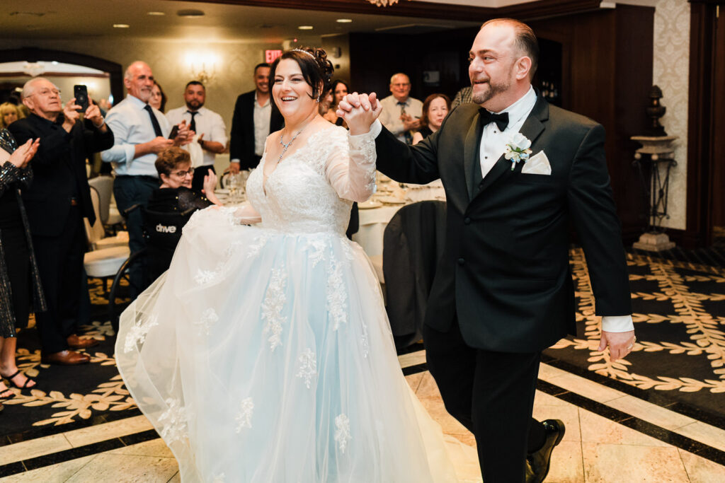 Bride and groom grand entrance into Macaluso's reception ballroom Hawthorne NJ