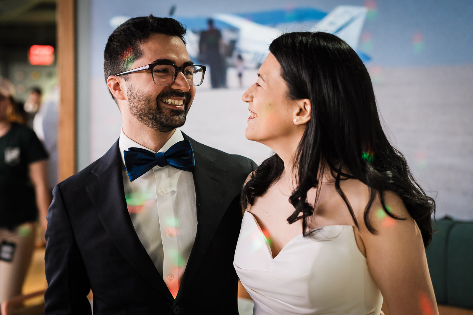 Bride and groom sharing a candid moment during their NYC wedding