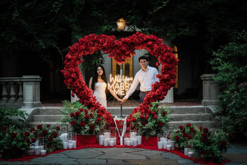 Custom red floral heart installation staged for a proposal at Van Vleck House Montclair