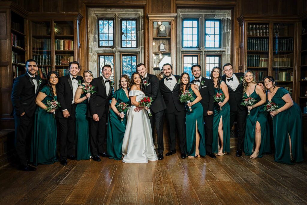 Wedding party posing together for traditional wedding photography at Skylands Manor in Ringwood NJ