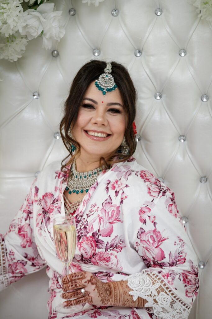 Bride displays intricate henna and bridal jewelry during morning wedding preparations in New Jersey