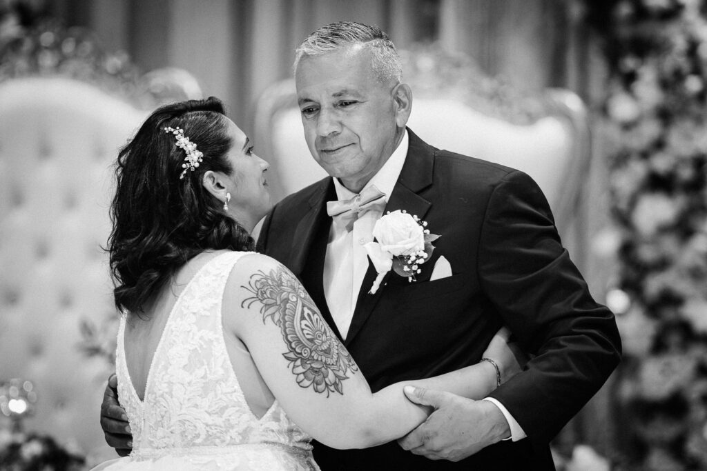 Bride dancing with an older family member during a New Jersey wedding reception