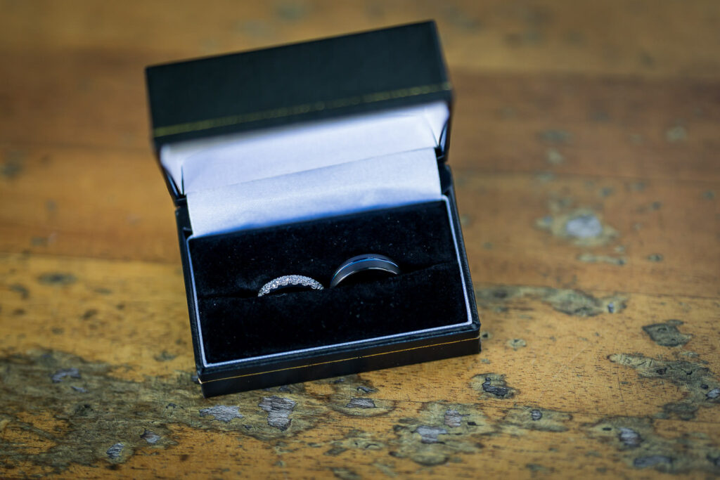 Open ring box photographed before a surprise proposal in New Jersey