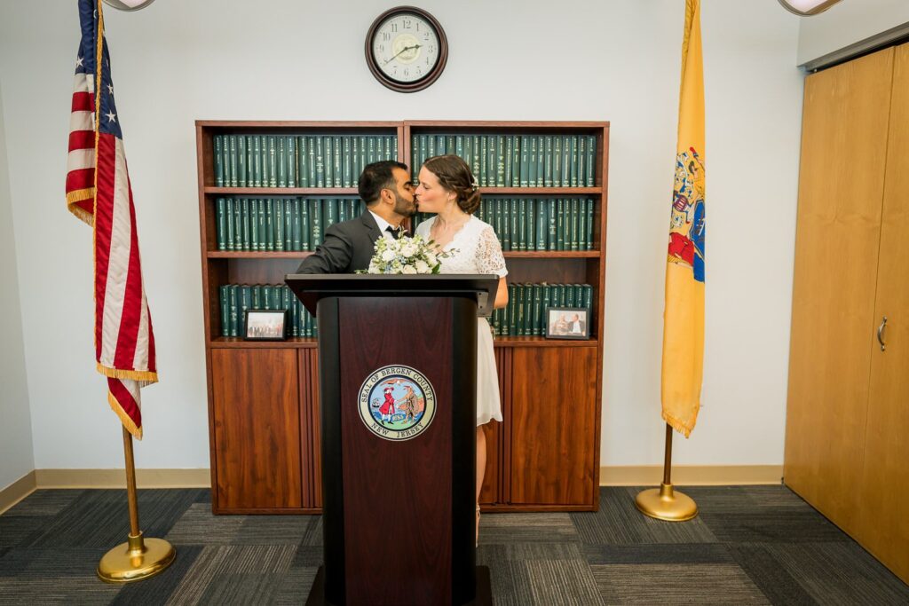 Ceremony room with flags and county seal at the Bergen County Clerk's Office in Hackensack NJ