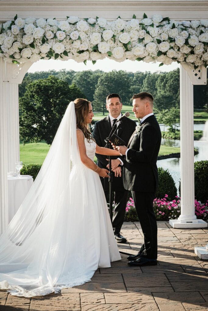 Ilysse and James at their outdoor wedding ceremony at Brooklake Country Club