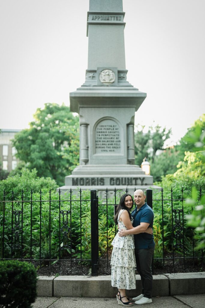 Engaged couple at the Morris County Civil War monument in downtown Morristown New Jersey