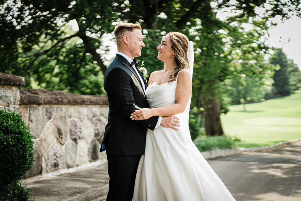 Ilysse and James together under the trees at their Florham Park NJ wedding