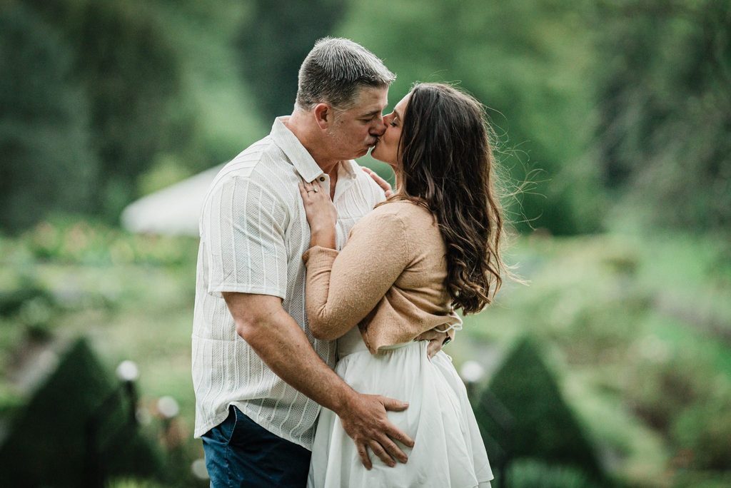 Engaged couple sharing a relaxed kiss during their New Jersey photo session
