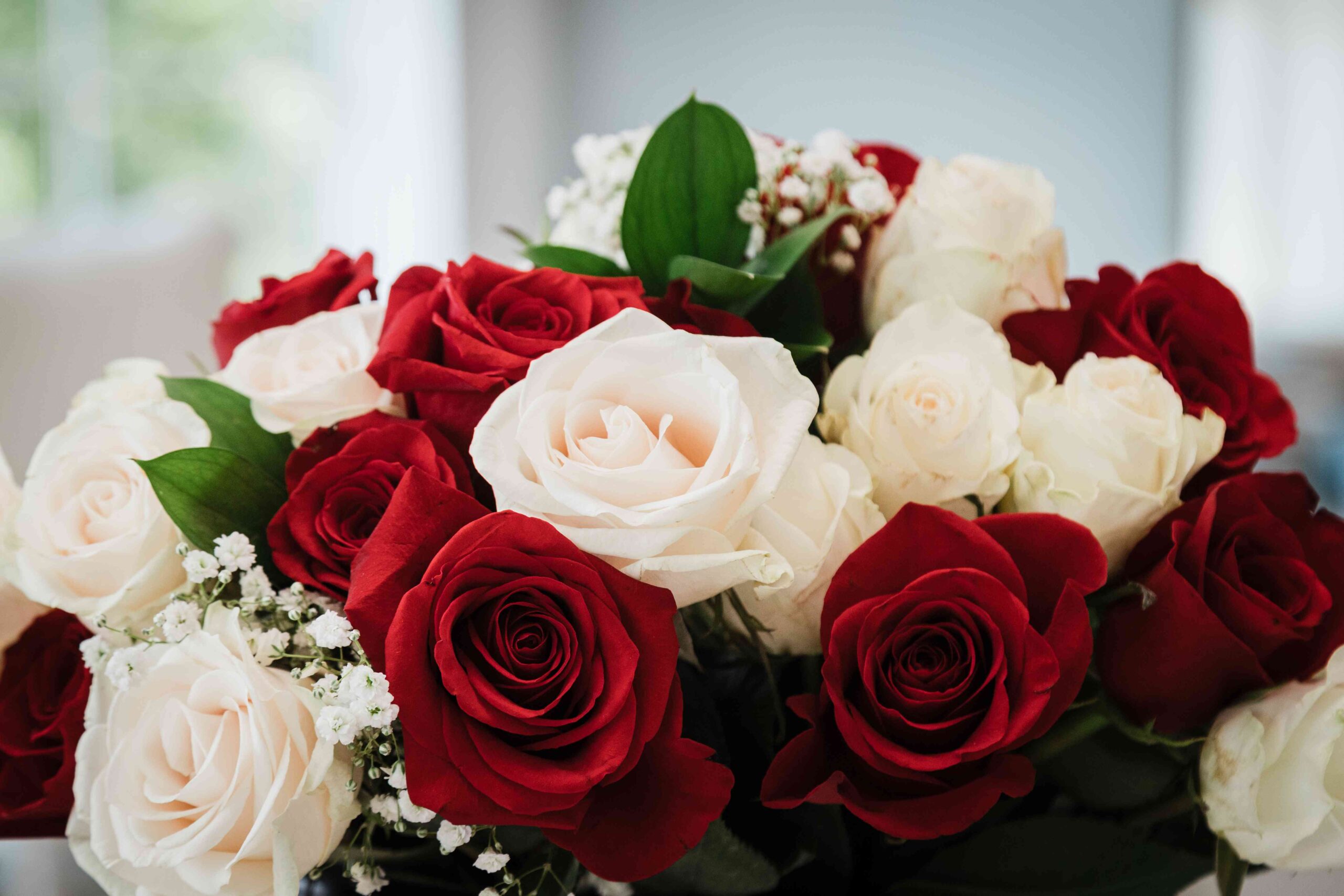 Red and white rose bridal bouquet at The Mill Lakeside Manor in Spring Lake NJ