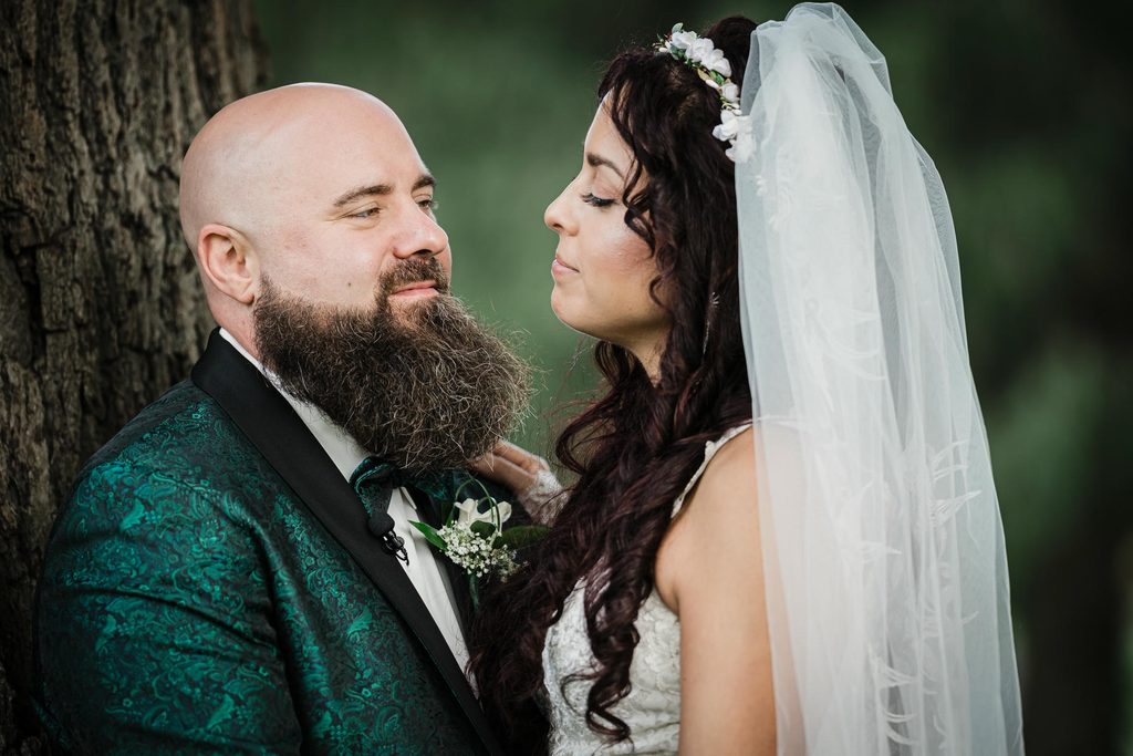 Close-up portrait of the couple smiling together at their Collingswood Grand Ballroom wedding
