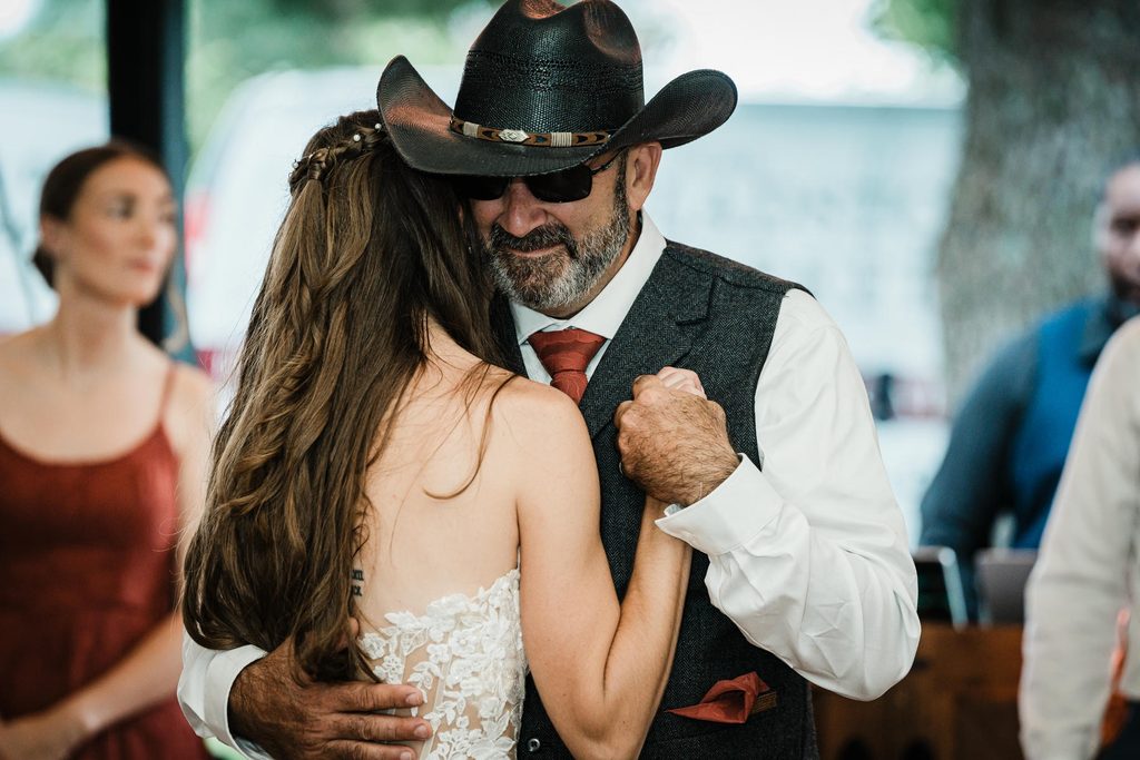 Guests dancing under the reception tent at a Franklin Township backyard wedding