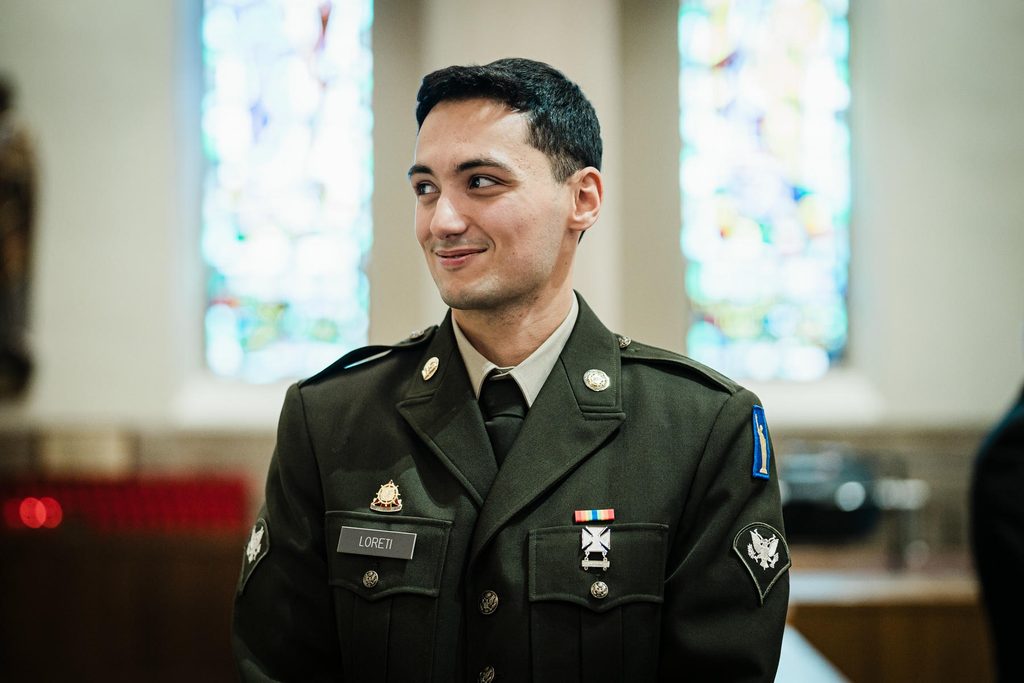 Groom in military dress uniform waiting at the altar of a Harrison NY church