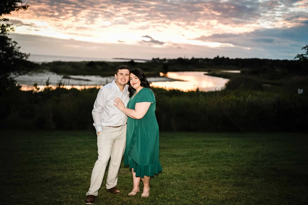 Engaged couple at sunset overlooking the marsh and Long Island Sound at Harkness